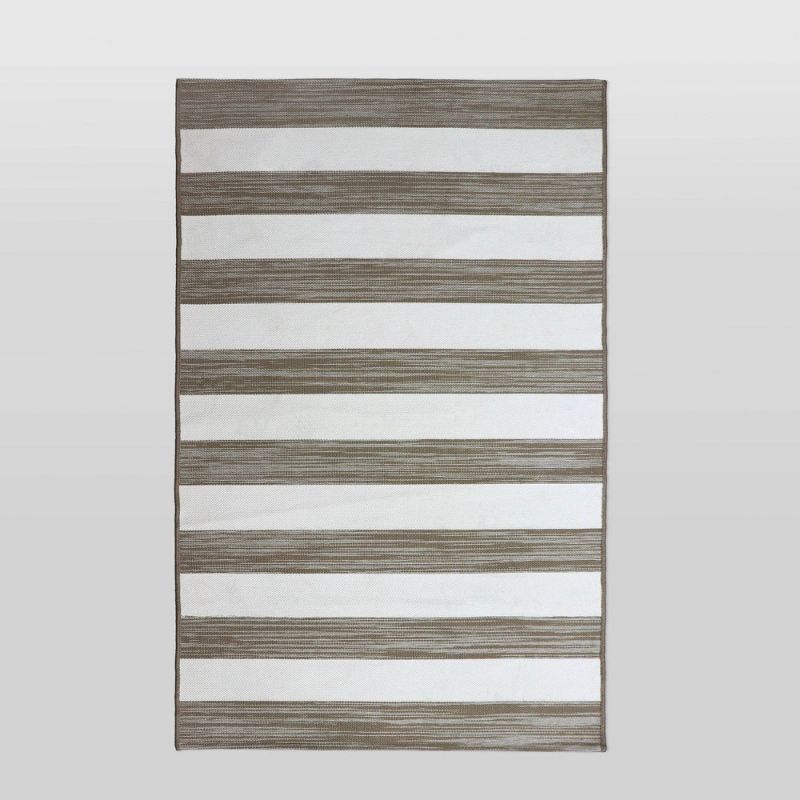 Photo 1 of 4'x6' Outdoor Rug Worn Stripe Tan - Threshold
