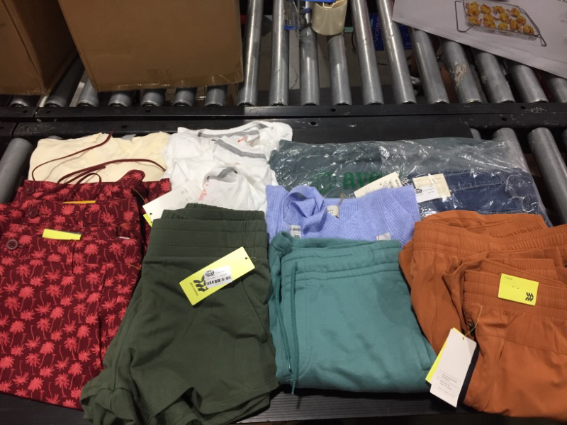 Photo 1 of BUNDLE OF CLOTHING VARIETY OF STYLES AND SIZES