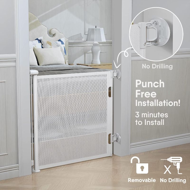 Photo 1 of BabyBond Products Indoor Outdoor Retractable Baby Gate, 33" Tall, Extends up to 71" Wide, White
