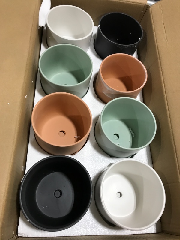 Photo 1 of (8 PACK)MULTI COLORED 6IN CERAMIC PLANTERS 