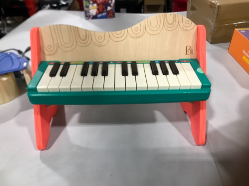 Photo 2 of B. toys Wooden Toy Piano - Mini Maestro