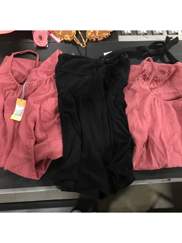 Photo 1 of A box lot of miscellaneous women's clothing . Contains S-M SIZES. SIZES VARY THROUGH OUT BAG. 