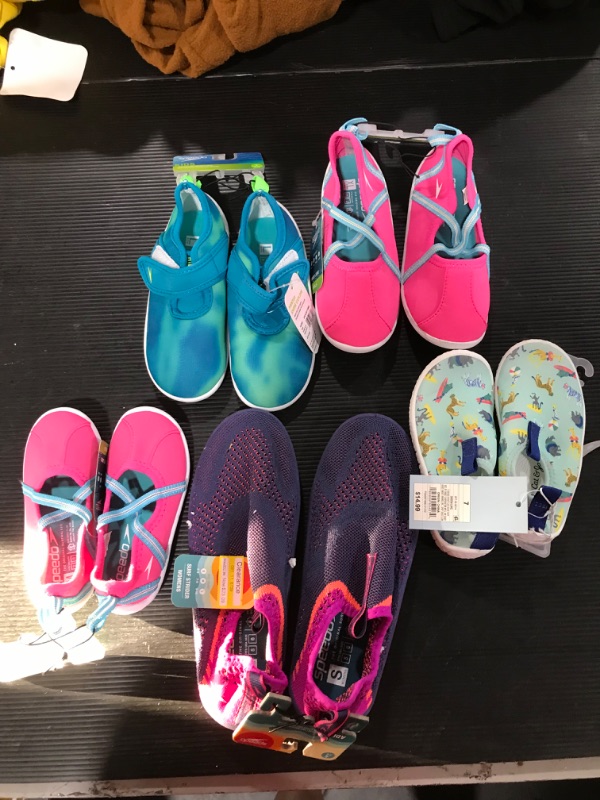 Photo 2 of A box lot of miscellaneous children's water shoes. SIZES vary throughout bag. 