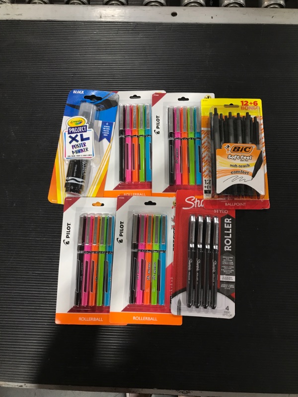 Photo 1 of A box lot of school supplies. Containing pens and 1 poster marker. 