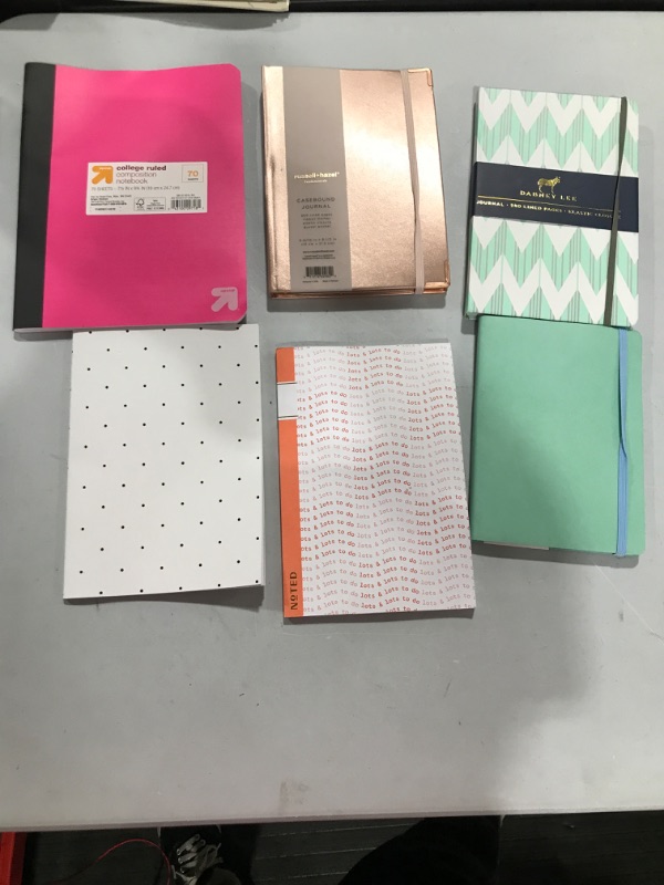 Photo 1 of ASSORTED NOTEBOOKS 