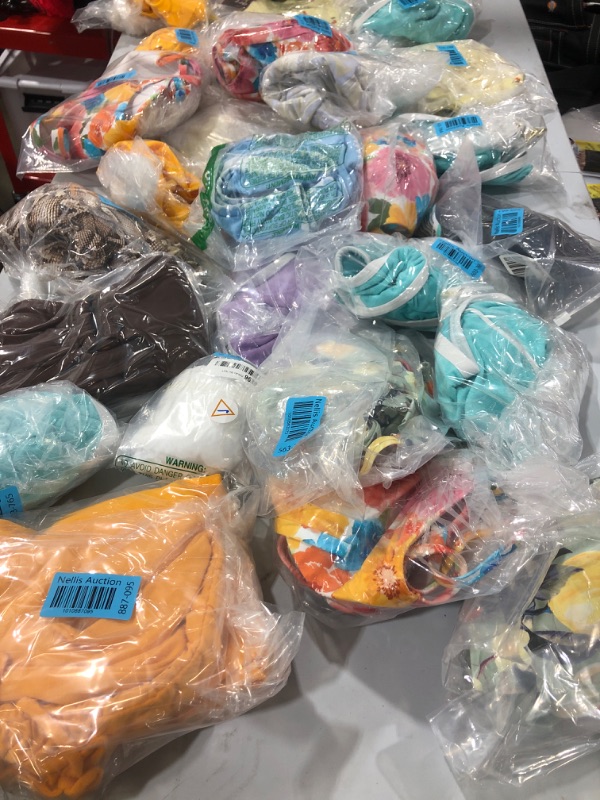 Photo 1 of BATHING SUIT/ CLOTHING BUNDLE VARIOUS STYLES AND SIZES