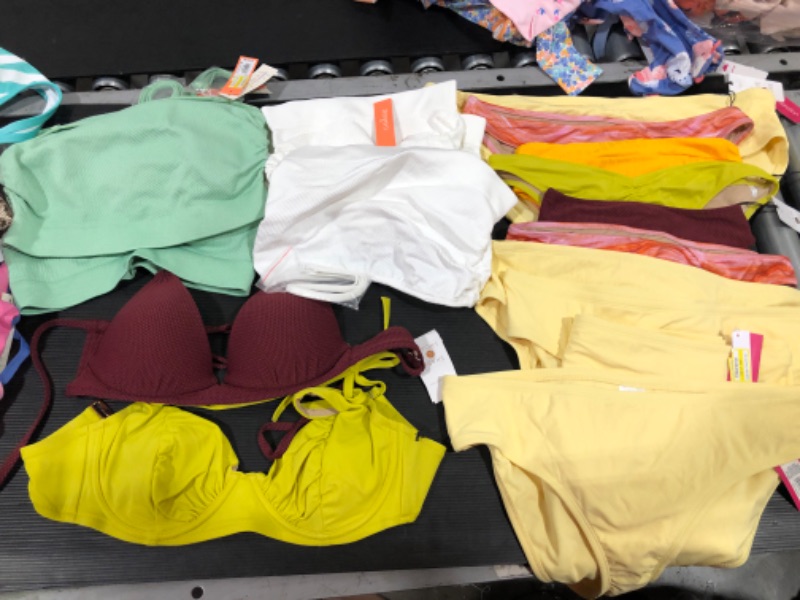 Photo 1 of BAG BUNDLE OF RANDOM BATHING SUITS *SIZES VARY* 