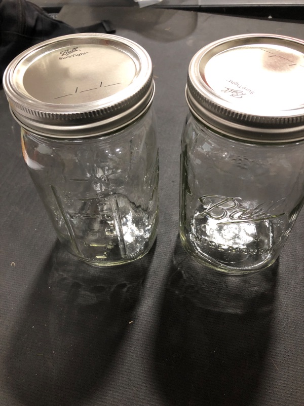 Photo 2 of 2 glass jars 