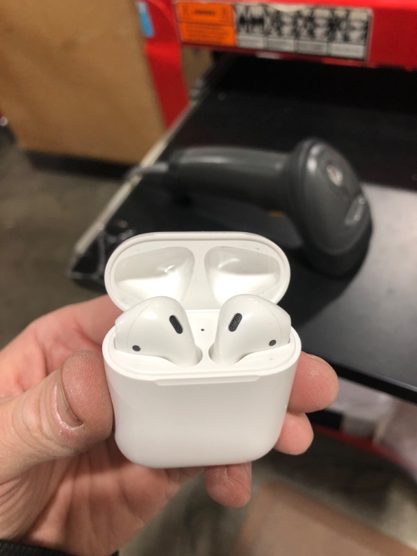 Photo 3 of Apple AirPods with Charging Case (Latest Model)