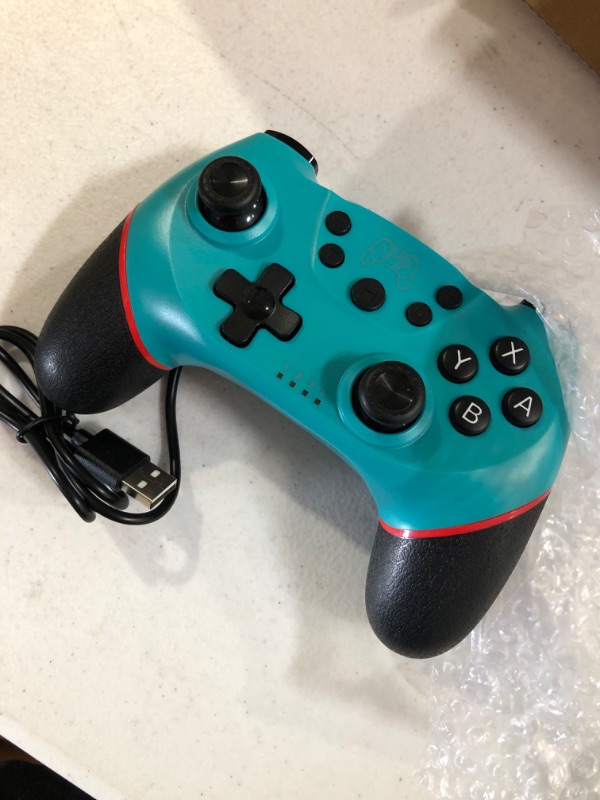 Photo 2 of Diswoe Switch Controller (Blue & Black)