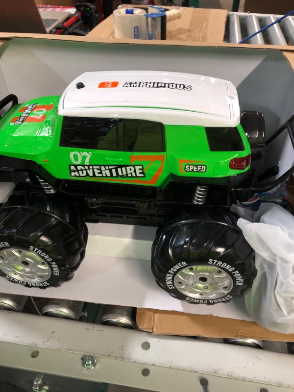 Photo 2 of **MISSING REMOTE**
Ruko 1601AMP2 Amphibious Remote Control Cars