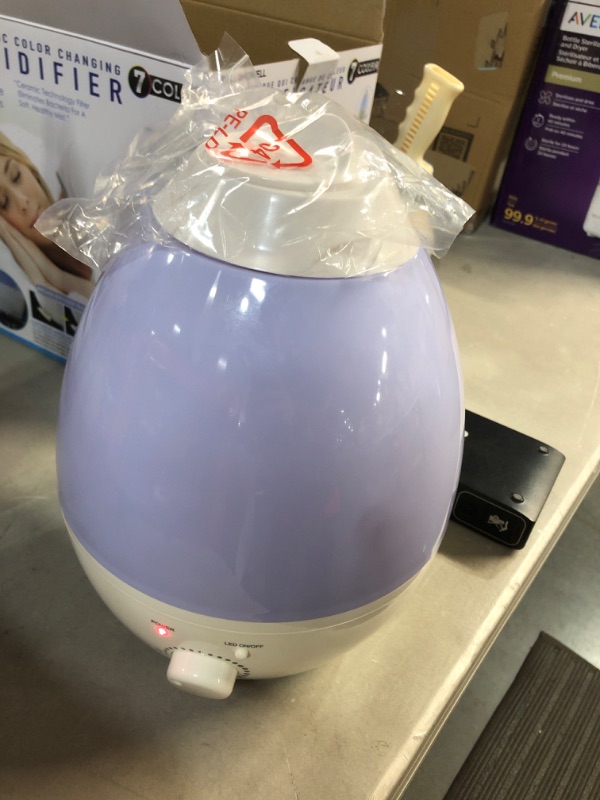 Photo 2 of **SEE NOTES**
Bell & Howell Ultrasonic Changing Humidifier, Aroma Diffuser