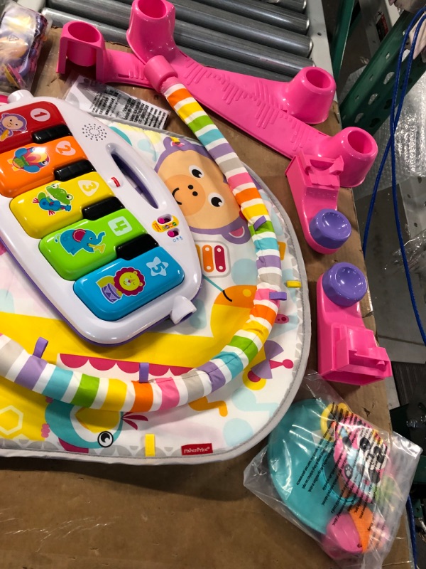 Photo 5 of **USED BUT APPEARS NEW**  Fisher-Price Deluxe Kick & Play Piano Gym, Pink, Baby Activity Playmat With Toy Piano, Lights, Music And Smart Stages Learning Content Pink Kick 'n Play Piano - Frustration Free Packaging