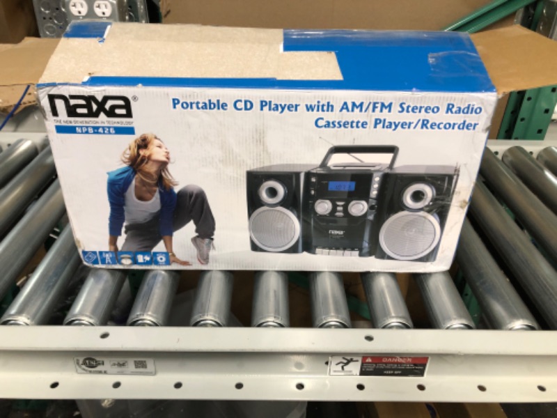 Photo 1 of NAXA Electronics NPB-426 Portable CD Player with AM/FM Stereo Radio, Cassette Player/Recorder and Twin Detachable Speakers