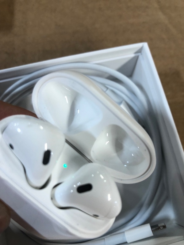 Photo 2 of Apple AirPods with Charging Case (Latest Model)