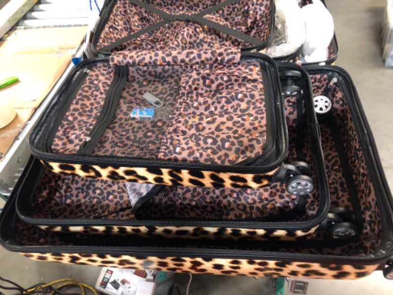 Photo 5 of **SEE NOTES**
Rockland Safari Hardside Spinner Wheel Luggage, Leopard, 3-Piece Set (20/24/28) 3-Piece Set (20/24/28) Leopard