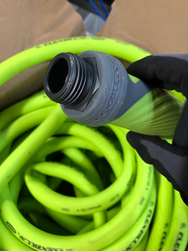 Photo 2 of *Used/WET* Flexzilla Garden Hose with SwivelGrip, 5/8 in. x 75 ft., Heavy Duty, Lightweight HFZG575YWS 