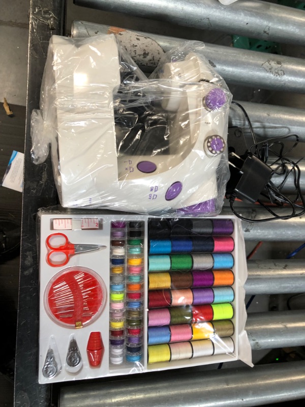 Photo 1 of Mini Sewing Machine with Extension Table - Portable Electric Sewing Machine for Beginners and Kids - Detachable Sewing Table and Foot Pedal- Portable for Small Projects and Quick Repairs