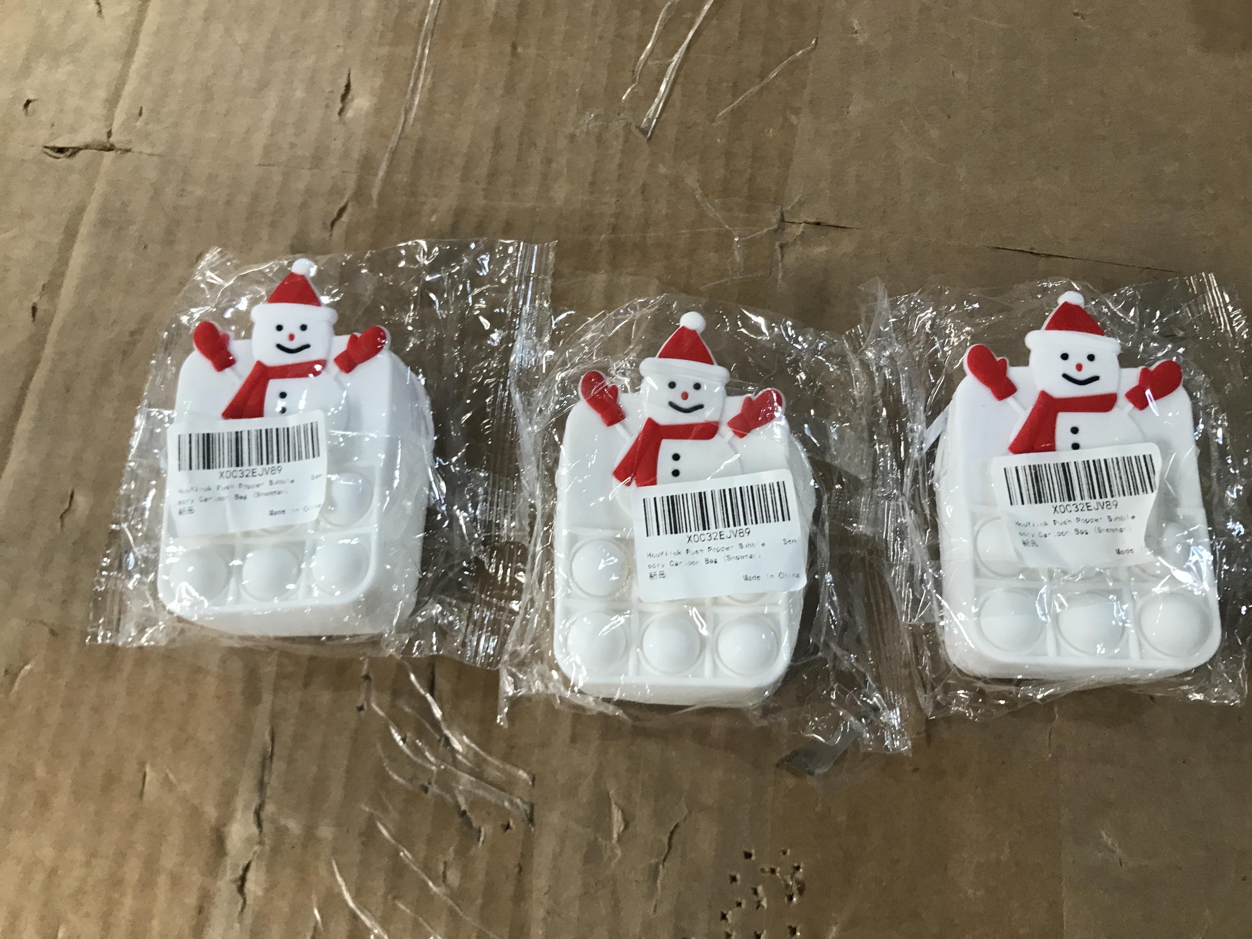 Photo 1 of 3 white snowmen pop it bags
