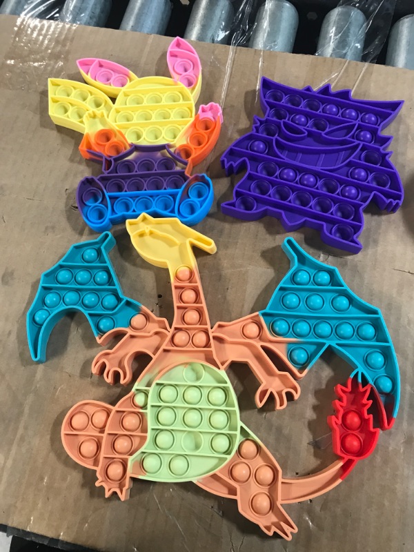 Photo 1 of 3 Pack of Pokémon poppits 