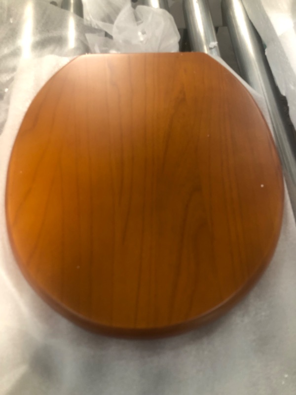 Photo 2 of **MISSING HARDWARE**
Solid Toilet Seat Mahogany Wood