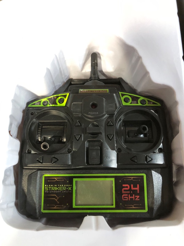 Photo 4 of **FOR PARTS ONLY**
World Tech Toys 2.4Ghz Striker Glow-in-The-Dark 4.5 Channel RC Spy Drone