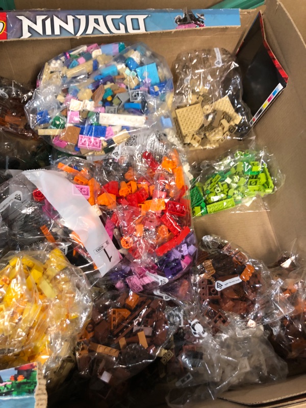 Photo 5 of **SEALED ASSORTMENT OF LEGOS**