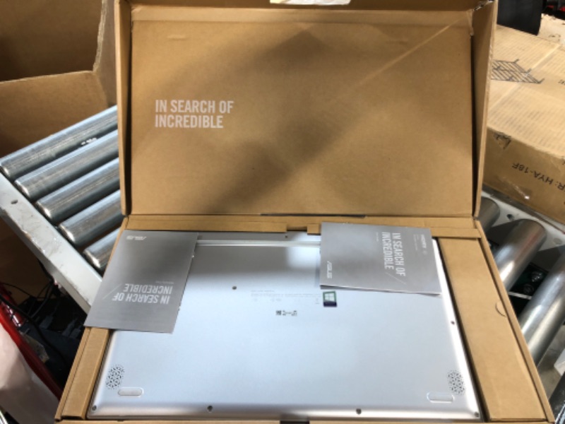 Photo 2 of **USED DOEESNT CHARGE** ASUS VivoBook 17.3" FHD Display, Ryzen 3250U Processor, 8GB DDR4 RAM, 256GB PCIe SSD, Windows 10 Home, Transparent Silver, M712DA-WH34