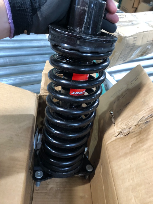 Photo 1 of Monroe Shocks & Struts Quick-Strut 171577L Strut and Coil Spring Assembly