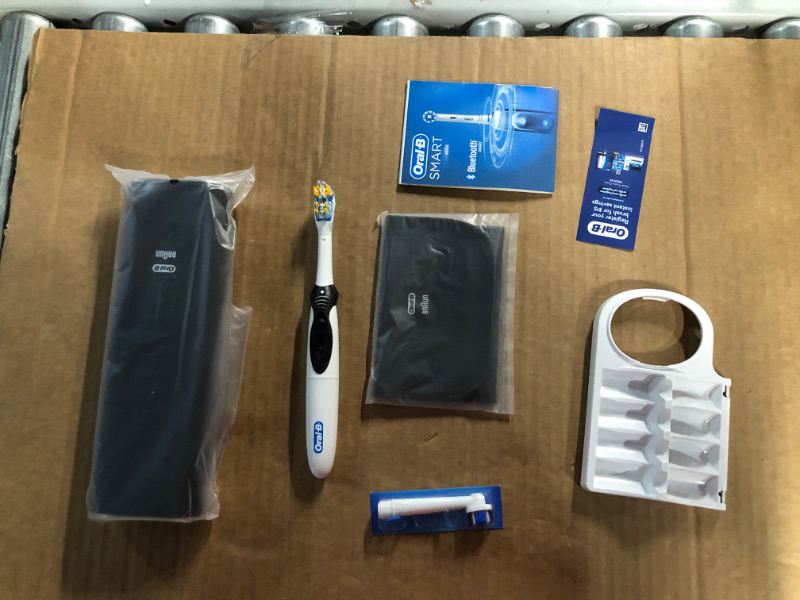 Photo 2 of ***UNTESTED - POSSIBLE MISSING PARTS - SEE NOTES*** Oral-B 7000 SmartSeries Black Electronic Power Rechargeable Toothbrush 8 Piece Set