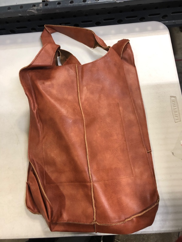 Photo 1 of brown leather bag 