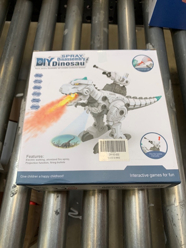 Photo 2 of Boys STEM Take Apart Dinosaur - Walking Dinosaur with Water Mist Spray & LED Lights Glowing Eyes & Projection Toys for 6 7 8 9 10 11 12 Old Boys Girls Gifts, Item is New, Item is Sealed

