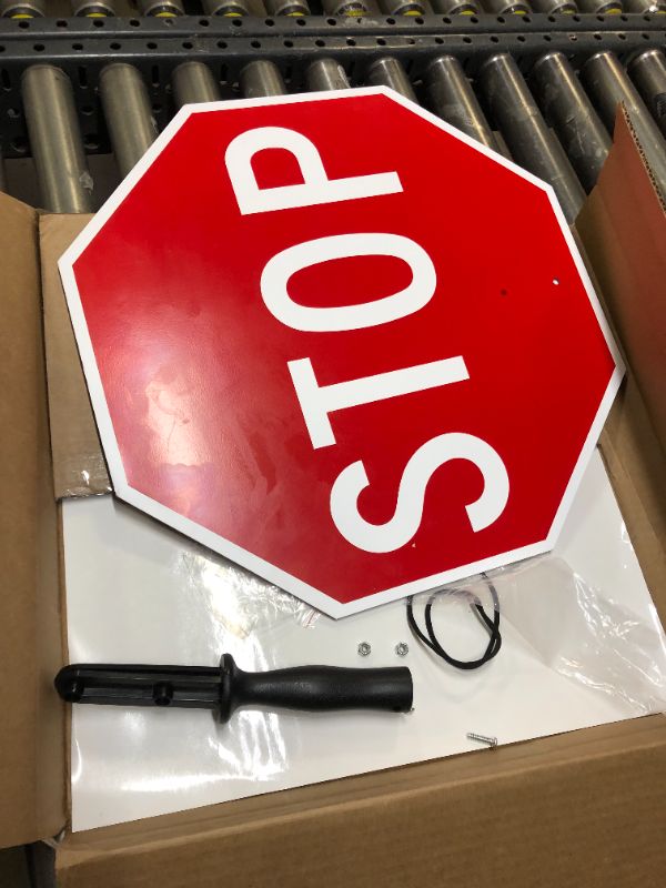 Photo 2 of SmartSign 18 x 18 inch Handheld “STOP - SLOW” Paddle Sign with Handle, Double-Sided, Screen Printed, 120 mil Aluminum Composite, Multicolor 18" Non-Reflective