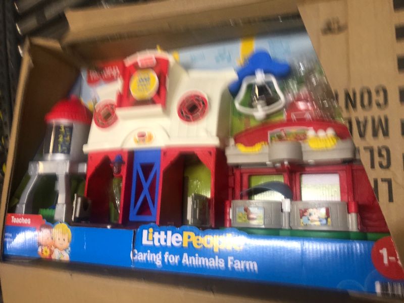 Photo 2 of Fisher-Price Little People Farm Toy, Toddler Playset with Lights Sounds and Smart Stages Learning Content, Caring for Animals Farm? Standard