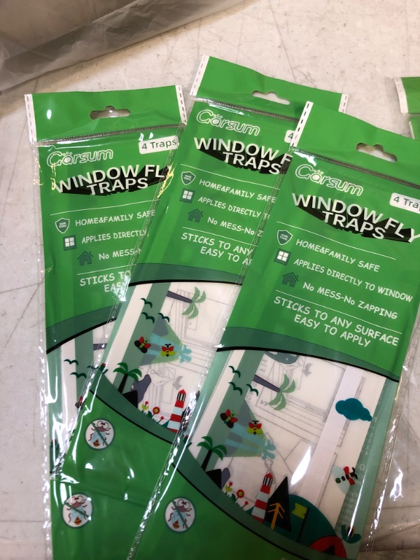 Photo 1 of Garsum Window Fly Traps Indoors, Fly Paper Sticky Strips, Non-Toxic Clear Fly Catcher, Fly Killer for Home Window Decal 12 Traps. SET OF 2, 24 TRAPS IN TOTAL
