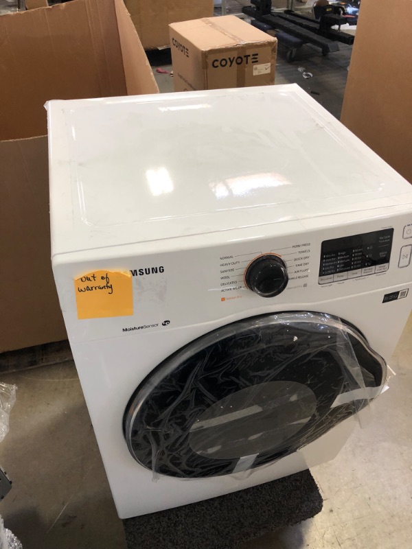 Photo 5 of 24 Inch Electric Dryer with 4.0 cu. ft. Capacity, Sensor Dry, Smart Care, Reversible Door, Stainless Steel Drum, 4-Way Venting, Internal Drum Light, Filter Check Indicator, 12 Dryer Programs, Quick Dry, Wrinkle Release, and Child Lock
   ----there is some
