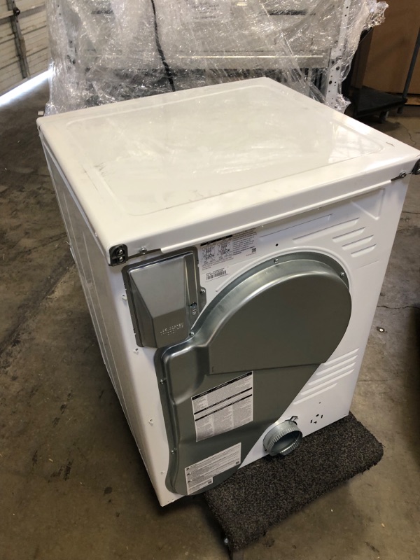 Photo 2 of 24 Inch Electric Dryer with 4.0 cu. ft. Capacity, Sensor Dry, Smart Care, Reversible Door, Stainless Steel Drum, 4-Way Venting, Internal Drum Light, Filter Check Indicator, 12 Dryer Programs, Quick Dry, Wrinkle Release, and Child Lock
   ----there is some