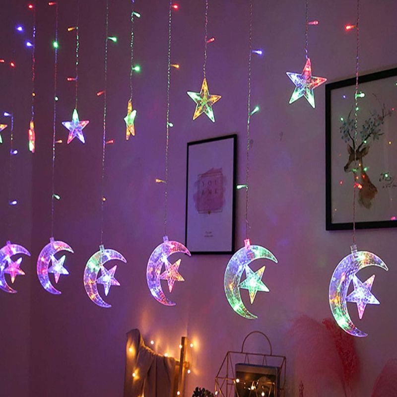 Photo 1 of Dgyus 138 LED Star Moon Curtain String Lights,11.5 Ft Curtain Light with Remote Control,Suitable for Ramadan,Christmas,Wedding,Party,Family,Patio Lawn (8 Modes) (USB Powered (Color)),white
