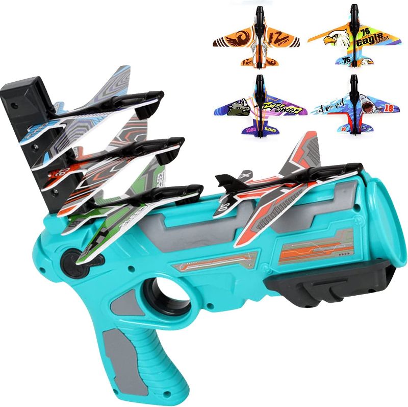 Photo 1 of Airplane Toy 2021 New Hot Toy Catapult Airplane Shooting Game Toy for Kids One-Click Ejection Model Foam Airplane with 4 Pcs Glider Airplane Launcher (Blue Set)  -- FACTORY SEALED --
