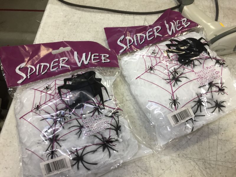 Photo 2 of 2 pack Spider Web, 200 Square Ft, Halloween Decorations, Spider Webs (200 Square Feet) (Packaging Artwork May Vary) Can Be Used As Fake Snow for Indoor Christmas Decorations, Remove Spiders
