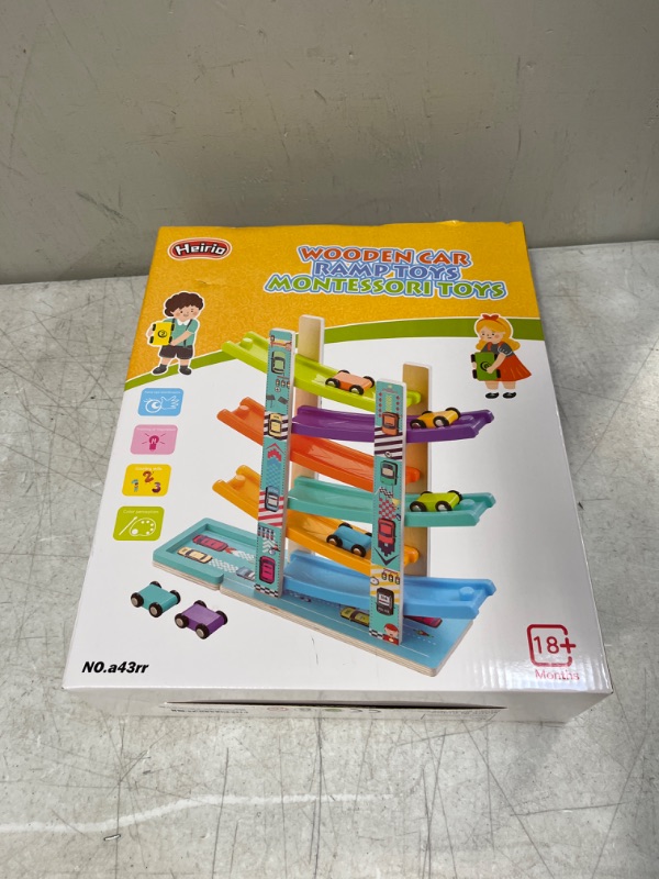 Photo 1 of Heirio Montessori Toys for Toddlers 1 2 3 Year Old Boys Girls, Wooden Car Ramp Toy Includes 6 Cars and Wood Parking Lot, Race Track Gift for Kids

