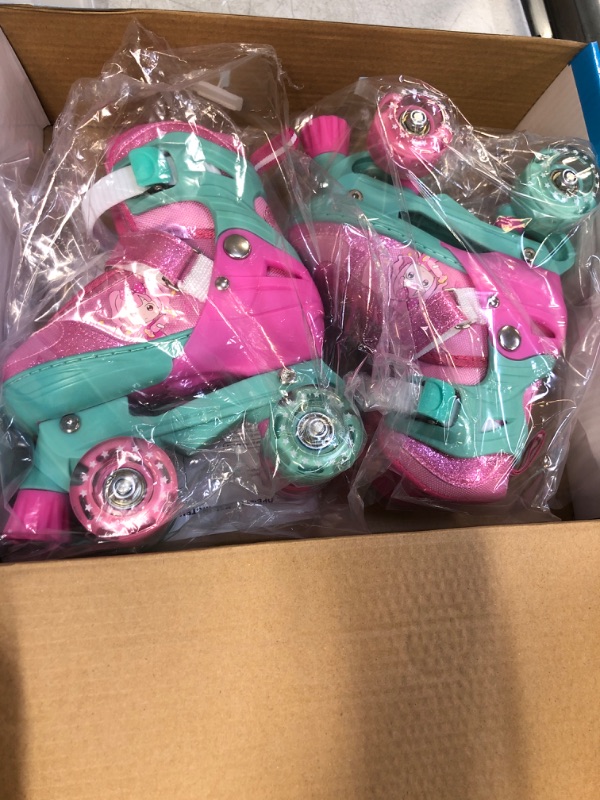 Photo 1 of GIRLS PINK ROLLER SKATES
31-34