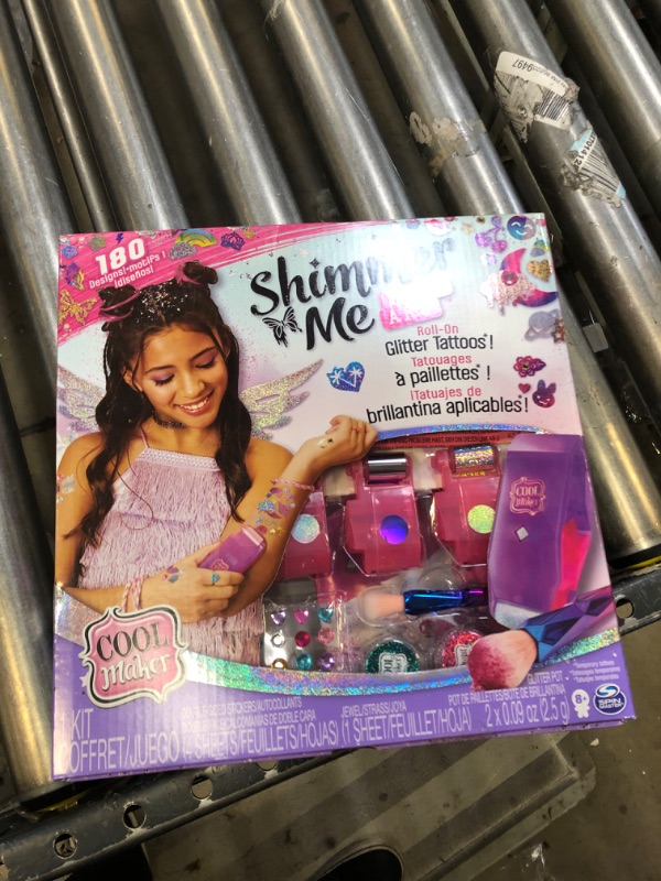 Photo 2 of Cool Maker, Shimmer Me Body Art with Roller, 4 Metallic Foils and 180 Designs, Temporary Tattoo Kids Toys for Ages 8 and up
