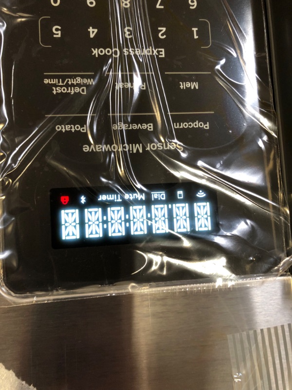 Photo 2 of 1.9 cu. ft. Over the Range Microwave in Stainless Steel with Sensor Cooking -------- MISSING GLASS PLATE