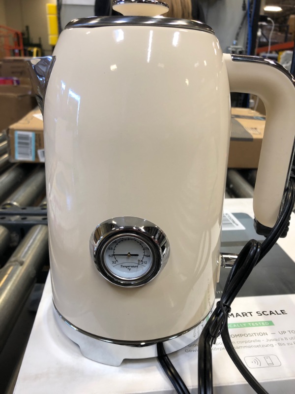 Photo 1 of beige electric kettle