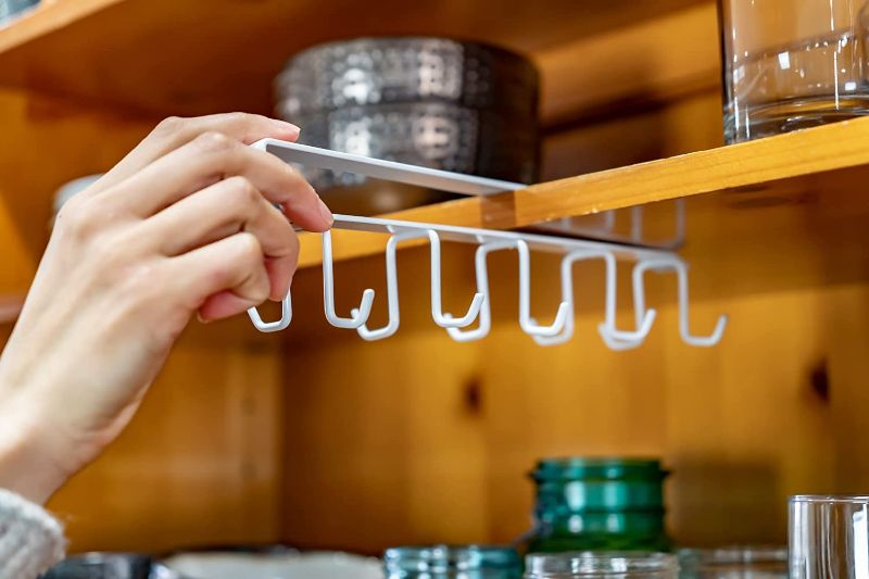 Photo 1 of Sivelo 2pcs Coffee Mug Organizer, Under Cabinet Utensils Holder. Great Hanger Rack for The Kitchen. No Drilling Nail Free. Hook to Organize Utensils and Coffee Cups. White.
