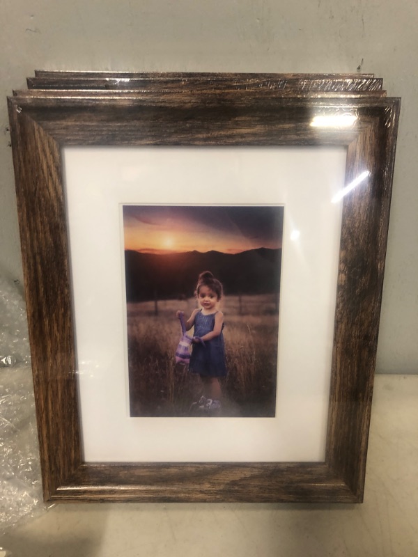 Photo 2 of Upsimples Home 8x10 Picture Frame, Real Glass and Composite Wood for Wall or Tabletop Display, Display 5x7 Frame with Mat or 8x10 Without Mat, Hanging Hardware Included, Set of 4, Brown