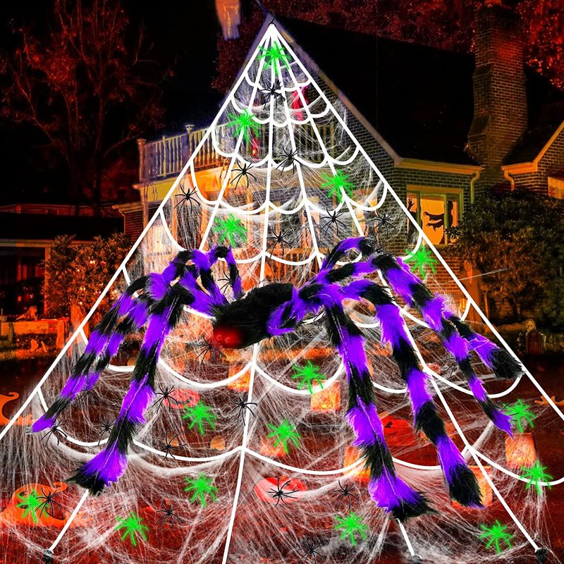 Photo 1 of 17 Ft Giant Spider Web Halloween Decorations Outdoor with 50" Large Purple Spider, Stretch Cobweb,10 Glow in The Dark Spiders 10 Fake Spiders Halloween Indoor Outside Creepy Decor Yard Lawn Garden
