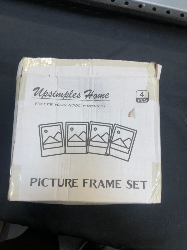 Photo 1 of 3 PK 10"x12" picture frames (packagning states 4, missing 1). 