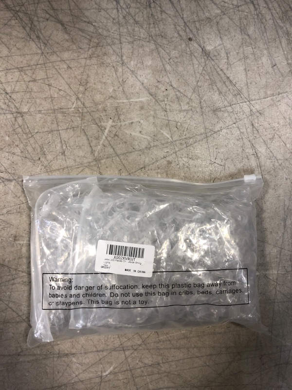 Photo 1 of Jetec 200 Pieces Christmas Light Clips Weatherproof Outdoor Lights Clip Outdoor Hang Gutter Hooks Christmas Decoration Hooks Clear Plastic Clips for Festival Decoration Outside String Lights
